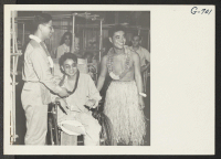 [recto] When the Shelby Hawaiians, a small Hawaiian orchestra composed of members of the 442nd Infantry, visited Walter Reed Hospital under ...
