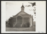 [recto] A church, now boarded up, formerly used by Japanese before their evacuation. ;  Photographer: Stewart, Francis ;  Florin, California.