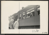 [recto] Woodland, Calif.--Evacuees of Japanese ancestry from this rich agricultural district are on their way to the Assembly Center. This special train consists of ten cars. ;  Photographer: Lange, Dorothea ;  Woodland, California.