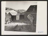 [recto] Buildings and views of ranch formerly owned and operated by farmer of Japanese ancestry. The soil in this area is very shallow with many large rocks. The ranch raises fruit but is now deserted. ;  Photographer: Stewart, Francis ;  Penryn, California.