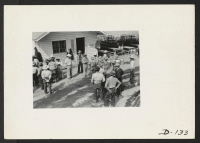 [recto] A view in the lunch shed at the farm. Trucks from the kitchens bring hot lunches to the workers. ;  Photographer: Stewart, Francis ;  Newell, California.