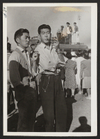[recto] Left to right--Henry Kaihara and Minoru Iwasaki. ;  Photographer: Cook, John D. ;  Newell, California.