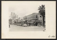 [recto] Sacramento, Calif.--Center of Japanese business district at Fourth and Capitol Streets two days before evacuation. ;  Photographer: Lange, Dorothea ;  Sacramento, California.