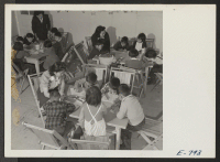 [recto] A pre-school class in the Jerome Center grade school. Teachers are Marie Izume, Nelli Nishimura and Emiko Shinagawa. Assistant teachers, such as those shown, are drawn from qualified residents (former west coast persons of Japanese ancestry). ;  Photogr