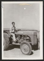 [recto] Tractor and driver. ;  Photographer: Cook, John D. ;  Newell, California.