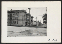 [recto] Apartment house at 410 Crocker Street, Los Angeles, Calif., formerly occupied by Japanese prior to evacuation. ;  Photographer: Stewart, Francis ;  Los Angeles, California.