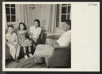[recto] Mr. and Mrs. Don H. Shima and their children, Tami, 10, and Donald, 9, formerly of the Gila River Relocation ...