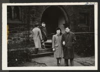 [recto] On their way to a picture show are Jimmie Okura and Jean Ikeguchi shown leaving the Co-op House in Cleveland ...