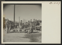 [recto] A practice fire drill gives the local fire department the necessary practice to handle any emergency which might arise. ;  Photographer: Stewart, Francis ;  Manzanar, California.