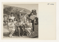 [recto] The Inouye home, Sequoia Nursery. Left to right, front row: Mrs. Dick Arimoto, Christina Arimoto, 11 months, Mr. K. Inouye ...