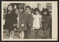 [recto] San Francisco, Calif.--These first-graders were pictured at Raphael Weill Public School, Geary and Buchanan Streets, on April 20, 1942, shortly ...