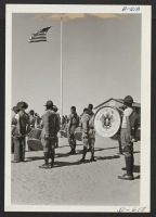 [recto] A scene from the Boy Scout Memorial Day Parade, which was held at this center on May 30. ;  Photographer: McClelland, Joe ;  Amache, Colorado.