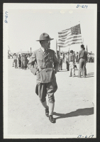 [recto] A scene from the Boy Scout Memorial Day Parade, which was held at this center on May 30. ;  Photographer: McClelland, Joe ;  Amache, Colorado.
