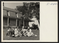 [recto] Soze and Mitsue Ito and their children, Diane and Joel, and Caucasian friends at the Putney School, Putney, Vermont. Itos came from the Gila River Center. ;  Photographer: Iwasaki, Hikaru ;  Putney, Vermont.