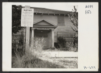 [recto] Taisho Y.M. (Young Men) Hall. This hall was a former meeting place for evacuees of Japanese ancestry. It is now used to store evacuee property and is boarded up. ;  Photographer: Stewart, Francis ;  Florin, California.