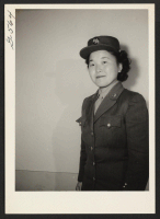 [recto] Private Shizuko Shinagawa, 21, of the Women's Army Corps, who was sent to Denver to recruit Japanese-American women for the ...
