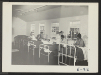 [recto] A view of the first ward (section in use), at the hospital which is still mostly under construction. ;  Photographer: Parker, Tom ;  Denson, Arkansas.