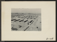 [recto] Eden, Idaho--A panorama view of the Minidoka War Relocation Authority center. This view, taken from the top of the water tower at the east end of the center, shows partially completed barracks. ;  Photographer: Stewart, Francis ;  Hunt, Idaho.
