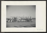 [recto] A Football squad at the Rohwer Center. ;  Photographer: Parker, Tom ;  McGehee, Arkansas.