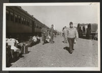 [recto] Train arrives from Gila. Luggage is first passed out through windows. ;  Newell, California.