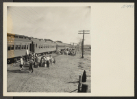[recto] Closing of the Jerome Center, Denson, Arkansas. Trucks carrying Jerome residents from their barracks to the train deposited them immediately ...