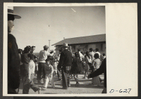 [recto] Some of the spectators who witnessed the Harvest Festival Parade held at the Gila River Center on Thanksgiving day. ;  Photographer: Stewart, Francis ;  Rivers, Arizona.