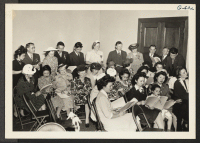 [recto] These guest at a get-acquainted party-sponsored by the Rochester, N.Y., Committee for the Resettlement of Japanese Americans are participating in ...