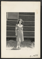 [recto] Sacramento, Calif.--Another of the young students of Japanese ancestry just evacuated, who has completed two years at the San Jose College. Her ambition is to become a nurse. ;  Photographer: Lange, Dorothea ;  Sacramento, California.