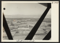 [recto] Aerial view of Colorado River reservation, location of Colorado River Relocation Center for persons of Japanese ancestry evacuated from the West Coast. ;  Photographer: Clark, Fred ;  Poston, Arizona.