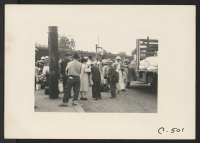 [recto] Woodland, Calif.--Women at railroad station on morning of departure of persons of Japanese ancestry from this agricultural community to the Merced Assembly Center. The woman in the dark slack suit is one of the few exhibiting grief on leaving. ;  Photog