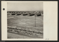 [recto] A typical barracks with a section of the Topaz Relocation Center. ;  Photographer: Parker, Tom ;  Topaz, Utah.