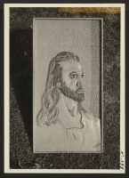 [recto] Woodcarving--Head of Christ--by K. Kamoda, Granada Project, Amache, Colorado. January 9, 1944. ;  Photographer: Iwasaki, Hikaru ;  Amache, Colorado.