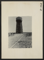 [recto] Eden, Idaho--One of several water towers which serves the Minidoka War Relocation Authority center. ;  Photographer: Stewart, Francis ;  Hunt, Idaho.