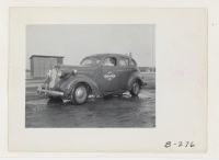 [recto] This photo shows one of the two patrol cars which are used by evacuee wardens. ;  Photographer: Stewart, Francis ;  Newell, California.