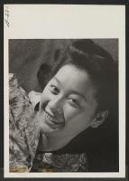 [recto] Typical of the young girls at the Heart Mountain Relocation Center is attractive Janice Shirota. ;  Photographer: Iwasaki, Hikaru ;  Heart Mountain, Wyoming.