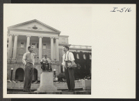 [recto] Keith Nakamura, honorably discharged Army veteran, and Toru Iura are shown in front of the statue of Abraham Lincoln at ...