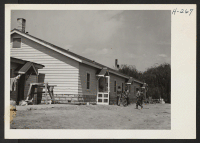 [recto] The mess hall on the Hellwig Brothers farm near St. Louis. This building was constructed by the proprietors for the use of the nearly 100 relocatees from the Rohwer Center who are employed on the farm. ;  Photographer: Mace, Charles E. ;  Gumbo, Misso