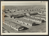 [recto] A view of the Granada Center looking northwest from the water tower. ;  Photographer: McClelland, Joe ;  Amache, Colorado.