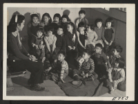 [recto] A nursery school group at the Heart Mountain Relocation Center where persons of Japanese parentage, evacuated from west coast defense areas, are now residing. ;  Photographer: Parker, Tom ;  Heart Mountain, Wyoming.