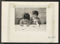 [recto] Drawing time in the nursery school. ;  Photographer: Stewart, Francis ;  Newell, California.