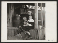 [recto] Oakies who are renting and farming property owned by evacuee. ;  Photographer: Stewart, Francis ;  Penryn, California.