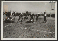 [recto] First touchdown was scored by Topaz team in football game with Fillmore on November 11, 1943 at Topaz Relocation Center. ;  Topaz, Utah.