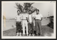 [recto] Four outstanding Tri-State High School leaders (L to R) Minoru Mochizuki, Shigeo Nakanishi, Yoshimitsu Hada, Paul Ohmura. ;  Photographer: Cook, John D. ;  Newell, California.