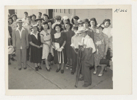 [recto] Shown are some arrivals in Fresno from the Rohwer Relocation Center. ;  Photographer: Iwasaki, Hikaru ;  Fresno, California.