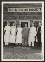 [recto] In front of Clark's Salad Dressing Company are shown, left to right, Cloyd Street, Forrest Thomas, Francis Ichikawa, Earl Fairbanks, ...