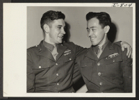 [recto] Pfc. Noboru Hokame, Hawaiian-born Japanese-American, and his Chicago buddy, Pfc. Charles P. Carroll, spent their convalescent furlough together recently at ...