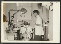 [recto] Interior of dental clinic. ;  Photographer: McClelland, Joe ;  Amache, Colorado.