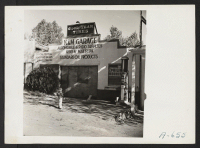 [recto] Stores and homes formerly inhabited by Japanese. Some of them are now used by Chinese people. Note boarded up windows and doors. ;  Photographer: Stewart, Francis ;  Penryn, California.