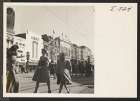 [recto] Canal Street is a main street in New Orleans and in many respects resembles Market Street in San Francisco. This picture is taken near Canal and Baronne Streets in the heart of the business district. ;  Photographer: Iwasaki, Hikaru ;  New Orleans, Lo