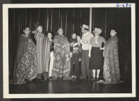 [recto] Pantomime skit put on by the Omaha WRA personnel entitled Wild Nell, Pet of the Plains. Cast from left to ...